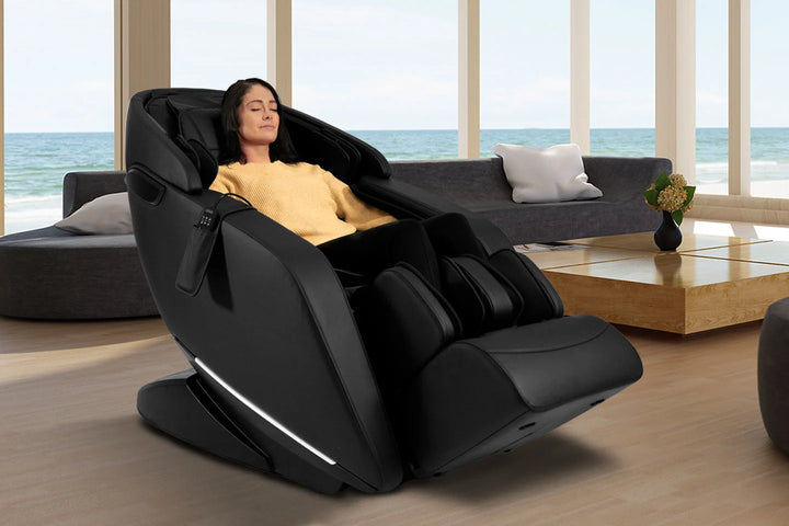 Kyota Genki M380 massage chair in black in a home setting